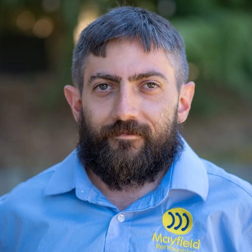 Senior engineering consultant at Mayfield Renewables in professional outdoor headshot
