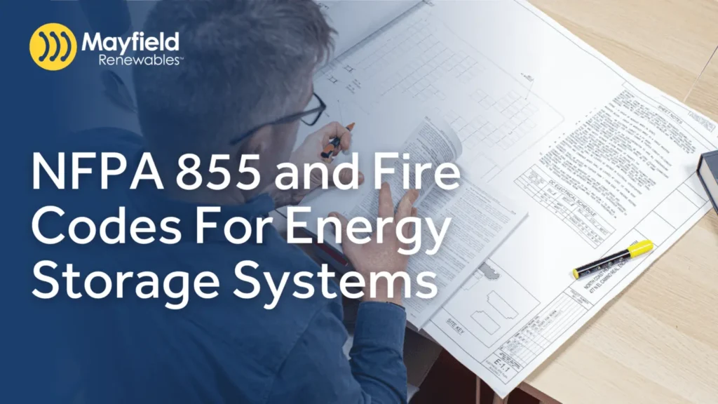 Engineer reviewing NFPA 855 fire code requirements for energy storage systems on plans
